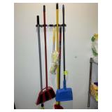 BROOMS AND MOPS. LOT LOCATED IN CARY