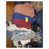 GROUP OF APRONS AND ADULT BIBS