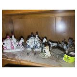 UPPER SHELF ON HUTCH INCLUDING DECORATIVE FIGURINE