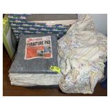 TOTE CONTAINING BEDDING ITEMS, BLANKETS