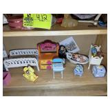 TWO SHELVES CONTAINING DOLL FURNITURE AND DECORATI