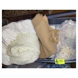 TOTE CONTAINING BEDDING ITEMS, BLANKETS