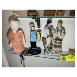 GROUP OF ORIENTAL FIGURINES