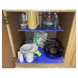 BOTTOM CABINET RIGHT OF DISHWASHER, PITCHERS, GLAS