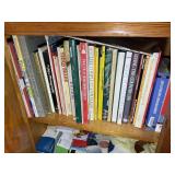 GROUP OF BOOKS AND CONTENTS OF BOTTOM CABINET