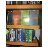 BOTTOM TWO SHELVES, LARGE GROUP OF DVD