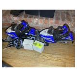 PAIR OF POLARIS REMOTE CONTROLLED SNOW MOBILE TOYS