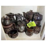 GROUP OF BROWN STONEWARE STYLE MUGS AND TEAPOTS
