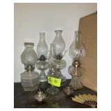 GROUP OF OIL LAMPS WITH CHIMNEYS