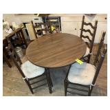 LAMINATE TOP ROUND DINING TABLE AND 4 LADDER BACK