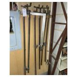 GROUP OF PIPE CLAMPS, 48 IN TO 63 IN LONG