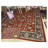 PAIR OF RED AND BROWN ORIENTAL TYPE RUGS, 79 IN X