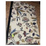TWO AREA RUGS, FLOWER PRINT 59 IN X 94 IN AND BLAC