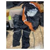 TOTE WITH ASSORTED MOTORCYCLE ITEMS, INCLUDING PRO