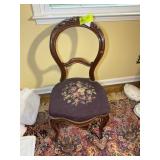 CARVED WOODEN SIDE CHAIR WITH NEEDLE POINT SEAT