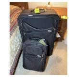 PAIR OF ROLLING LUGGAGE