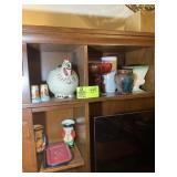 CONTENTS ON LFT OF ENTERTAINMENT CENTER , VASES, F