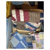 TOTE CONTAINING QUILT SQUARES AND QUILTING ITEMS
