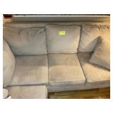 TAN UPHOLSTERED SECTIONAL SOFA, APPROX 108 IN X 91