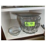 BOTTOM SHELF TO RT OF STOVE INCLUDING GLASS BAKING
