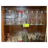 TOP TWO SHELVES OF MISC GLASSWARE, PITCHERS
