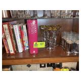 BOTTOM SHELF INCLUDING COOK BOOKS AND MISC GLASSWA
