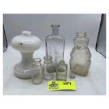 GROUP OF MISCELLANEOUS CLEAR GLASS BOTTLES THE ELL