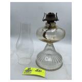 VINTAGE CLEAR GLASS OIL LAMP APPROXIMATELY 11 IN T