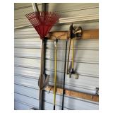 GROUP OF YARD TOOLS, INCLUDING RAKES, AX, SHOVELS