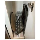 CABINET  WITH BAKING SHEETS, MUFFIN PANS, PIZZA ST