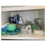 CONTENTS OF CABINET ABOVE FRIDGE, PLASTIC STORAGE