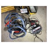 GROUP INCLUDING BATTERY CHARGER, JACKSTANDS, JUMPE