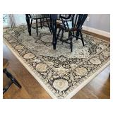 TAN AND BROWN AREA RUG, 79 IN X 118 IN