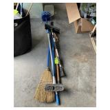 GROUP OF BROOMS AND DUSTERS