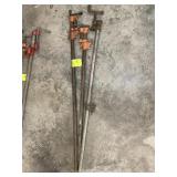 GROUP OF PIPE CLAMPS, 36 IN, 48 AND 55 IN LONG