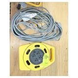 ROLL UP EXTENSION CORD AND GRAY EXTENSION CORD