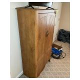 TWO DOOR CABINET WITH 4 SHELVES, 34.5 IN X 26 IN X