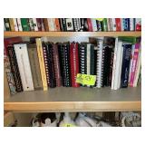 BOTTOM SHELF OF COOK BOOKS