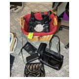 WICKER BASKET WITH MISC WOMENS PURSES AND HAND BAG
