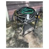 Plastic rolling cart with water hose