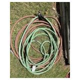 Green and red garden hose