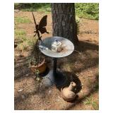 Group including metal stand flower pot, metal yard