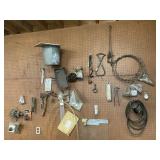 CONTENTS ON BACK WALL, INCLUDING ANIMAL TRAPS, CUR