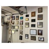 Group of trophy plaques on wall