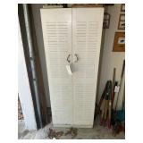 Two door metal cabinet 24" x 13" x 64" no contents