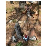 Group of figurines and yard art, concrete girl 25