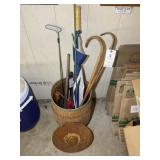 Nail keg with umbrellas and wooden canes