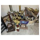 Group of car show trophies and plaques on floor