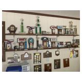 Group of car show trophies on Wall