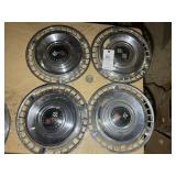 GROUP OF FOUR 1961 CHEVROLET HUBCAPS